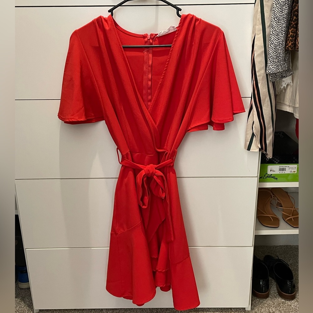 Very cute red flutter wrap dress